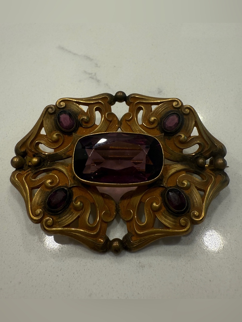 Antique Victorian Gold Tone Brooch with Purple Faceted Stones
